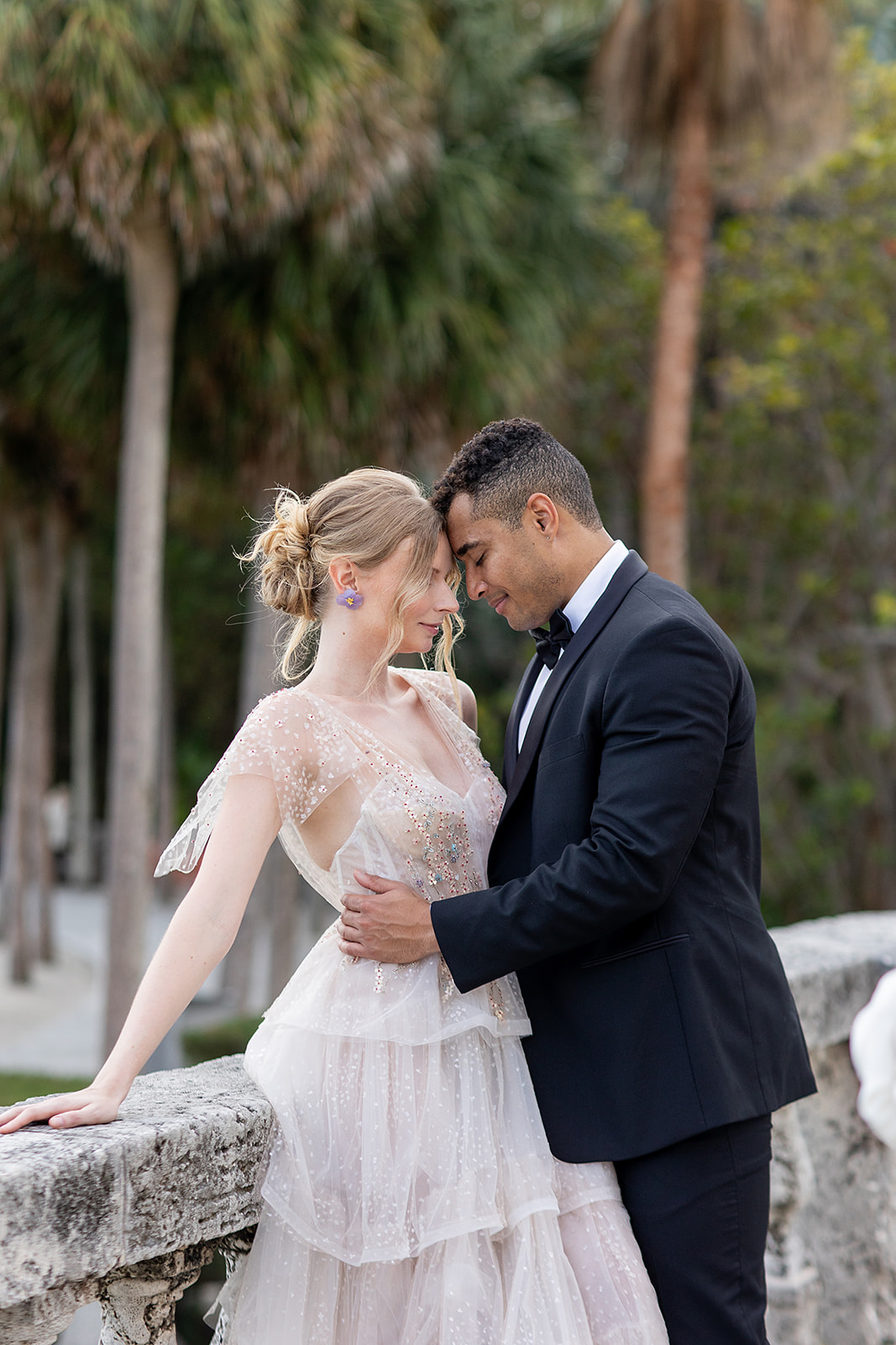 Bride and groom exchange vows at the Tea House at Vizcaya Museum and Gardens